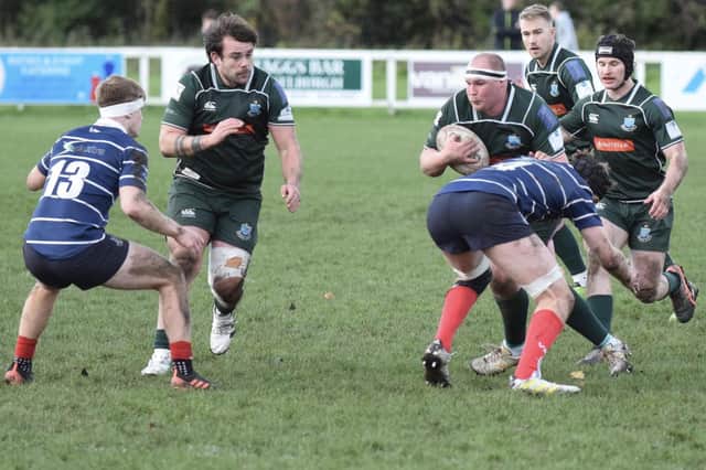 Captain Matt Carryer on the ball for Hawick at Musselburgh, with Shawn Muir, left, in support (Photo: Malcolm Grant)