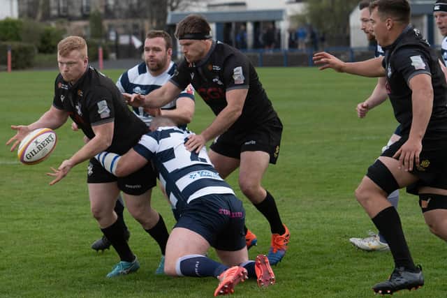Southern Knights' Fraser Renwick being tackled by Michael Liness of Heriot's at Goldenacre in Edinburgh on Saturday (Photo by Mark Scates/SNS Group/SRU)
