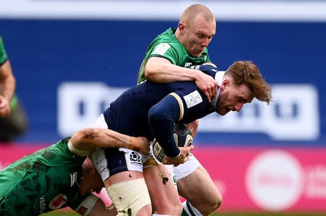 Scotland's Stuart Hogg being tackled by Keith Earls and Garry Ringrose of Ireland at Murrayfield Stadium in Edinburgh (Photo by Stu Forster/Getty Images)
