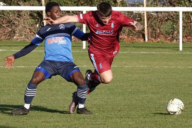 Mark Deya putting in a tackle for Vale of Leithen against Haddington Athletic at the weekend (Pic: David Wilson)