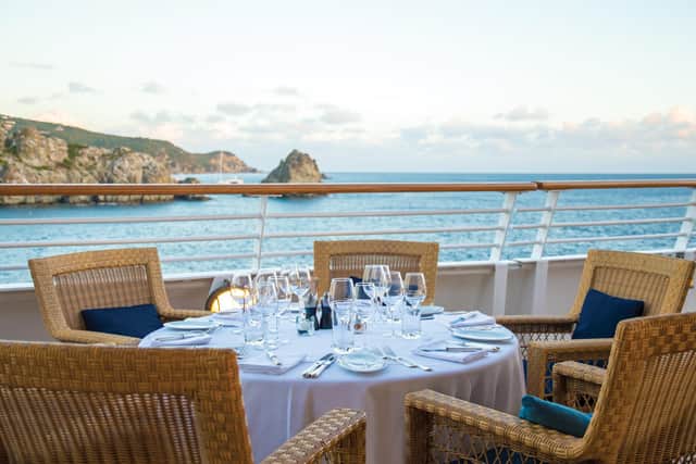The elegant open seating plan with stunning views at the Topside Restaurant. Image: SeaDream Yacht Club