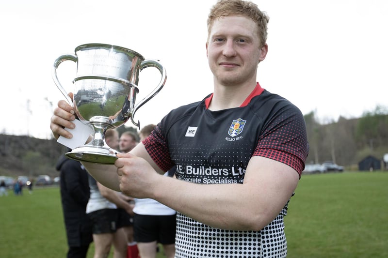 Kelso captain Frankie Robson with Langholm Sevens' winners' trophy