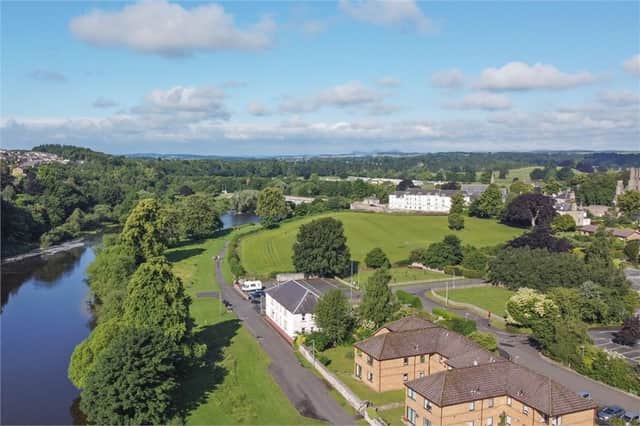 The first-floor property is a stone's throw from the River Tweed.