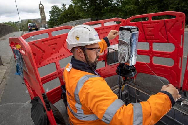 An Openreach engineer at work in Peebles.
