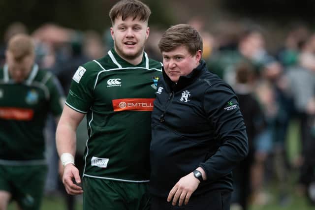 Hawick head coach Matty Douglas with centre Andrew Mitchell after Saturday's Tennent's Premiership play-off final win against Currie Chieftains at Mansfield Park (Photo by Mark Scates/SNS Group/SRU)