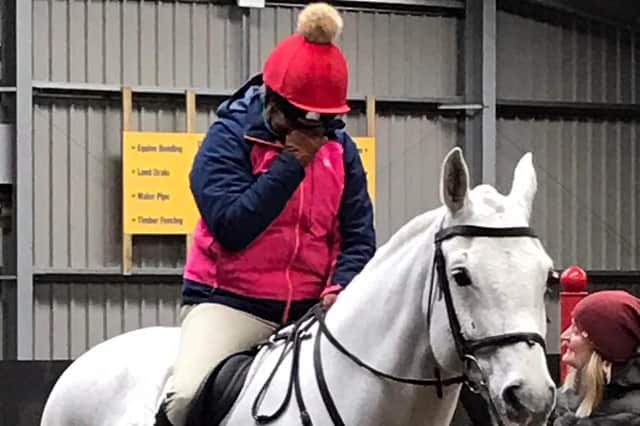 After sitting on a Riding for the Disabled horse for the first time since her stroke, Emma burst into tears of joy.