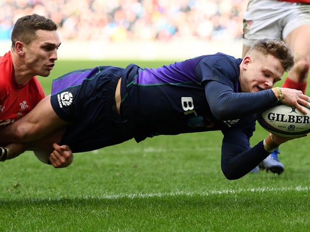 Darcy Graham scoring his first Scotland try versus Wales at Murrayfield Stadium in Edinburgh in March 2019 (Photo by Stu Forster/Getty Images)
