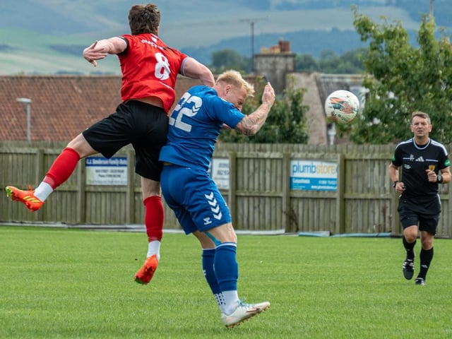 Michael Allan contesting an aerial ball for Coldstream during their 4-4 draw at home to Kirkcaldy and Dysart on Saturday (Photo: Julie Russell)
