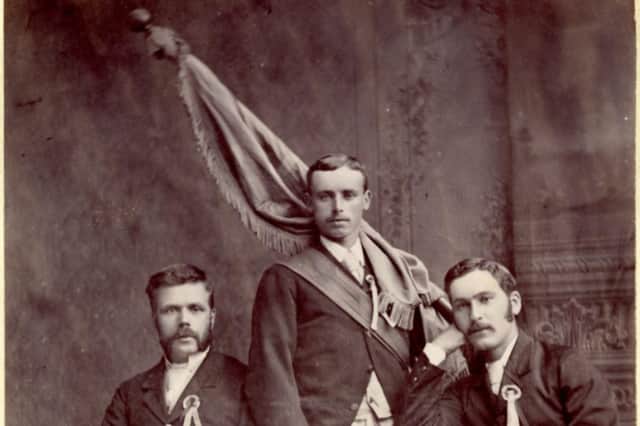 Picture of the 1881 Cornet John Smith with right-hand man Robert Amos and left-hand man George Cavers, taken in the studio of John Y Hunter,