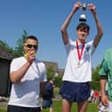 Cameron Rankine, winner of St Boswells village race's class for male runners aged 16 to 39, with runner-up Hugo Lee and third-placed Peter Farquhar
