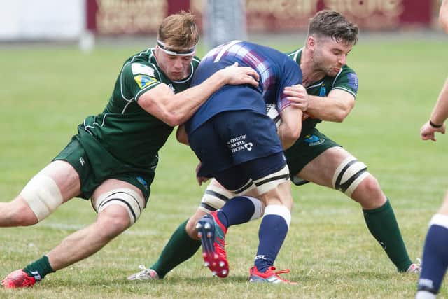 Hawick's Jae Linton putting a tackle in against Selkirk (Photo: Bill McBurnie)