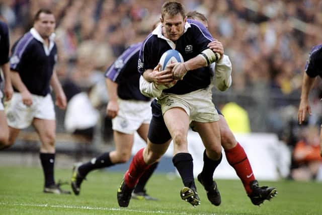 Gary Armstrong being tackled during France's Five Nations match against Scotland at the Stade de France in Paris (Photo: David Rogers /Allsport)