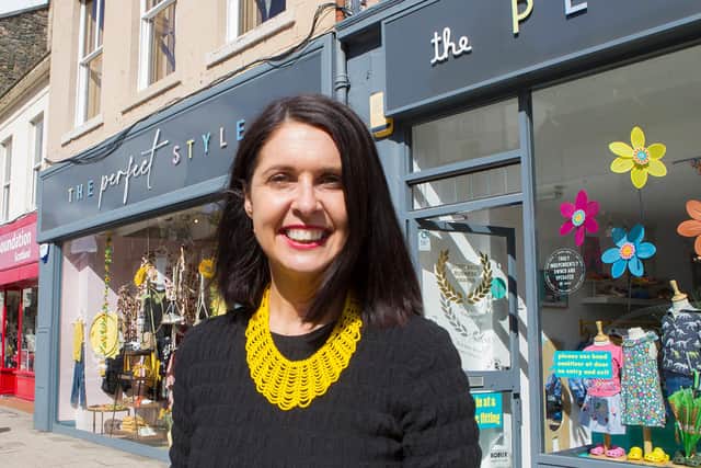 Kerrie Guiney outside The Perfect Fit and The Perfect Style outlets in Peebles High Street. (Photo: BILL McBURNIE)
