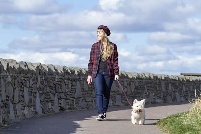Daisy and Westie Holly wear the New York City Tartan Week tartan.