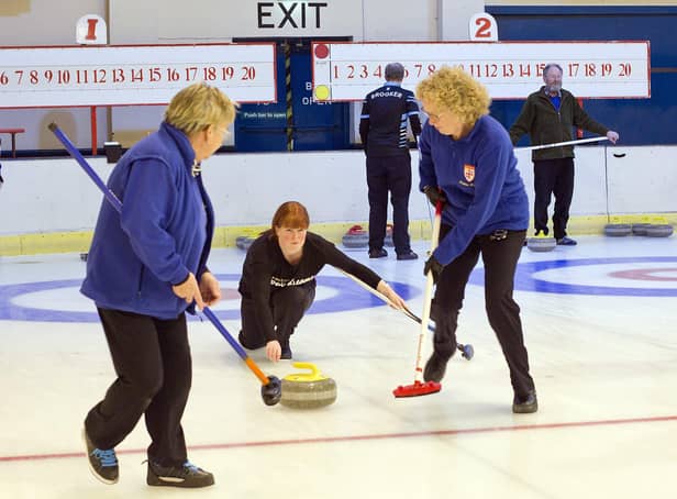 Claire Livingstone delivers a stone at the Border Ice Rink. Photo: Bill McBurnie.