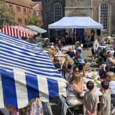 Locals soak up the sun at last year’s event in Kirk Square.