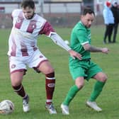 Goal-scorer Craig McBride on the ball for Langlee Amateurs, with Robert Reid challenging, during their 3-1 win at home to Chirnside United on Saturday in the Border Amateur Football Association’s A division (Photo: Grant Kinghorn)