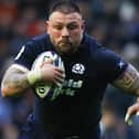 Rory Sutherland on the ball for Scotland, going up against Harison Mataele, during their 56-0 win against Tonga at Murrayfield Stadium in Edinburgh on Sunday (Photo: Craig Williamson/SNS Group/SRU)