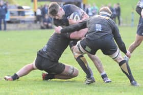 Ruaridh Murray being tackled during Selkirk's 40-36 loss away to Currie Chieftains on Saturday (Photo: Grant Kinghorn)