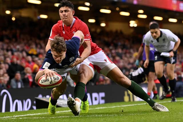 Hawick's Darcy Graham scoring Scotland's only try against Wales despite Louis Rees-Zammit's effortd to stop him (Photo by Stu Forster/Getty Images)