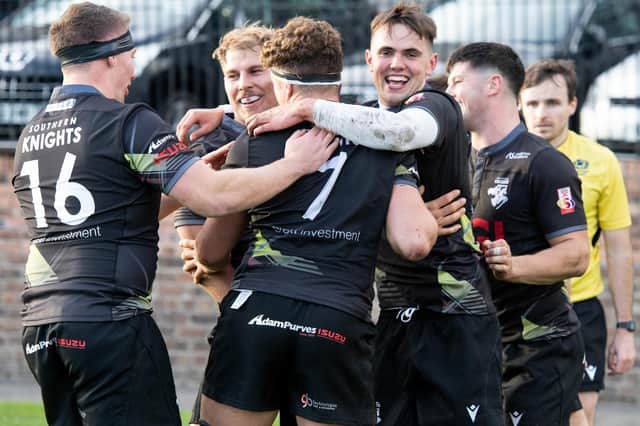 Southern Knights winger Aidan Cross, fourth from left, celebrating one of his two tries at Heriot's on Saturday (Photo by Paul Devlin/SNS Group/SRU)