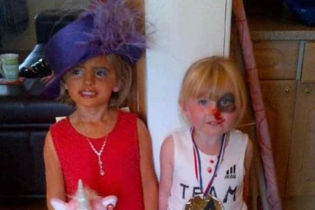 Youngsters Keely Jo Virtue and Sophie Crowe get ready for a fancy dress.
