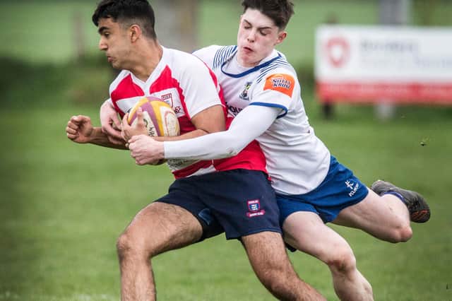 Rio Bhatia on the ball for Peebles Colts at Earlston's semi-junior sevens