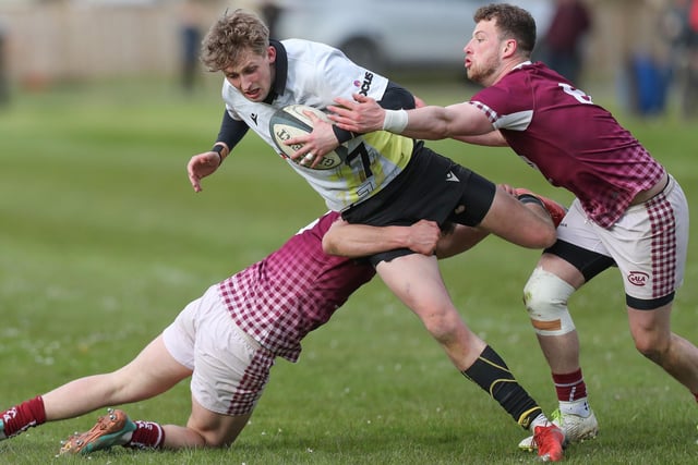 Melrose's Hamish Weir being tackled by Gala in the final at 2024's Langholm Sevens on Saturday (Photo: Brian Sutherland)