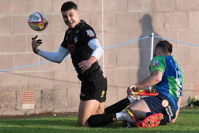 Ben Afshar celebrates scoring a try for Southern Knights versus Boroughmuir Bears at Meggetland Sports Complex in Edinburgh on Friday (Photo by Mark Scates/SNS Group/SRU)