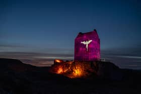 Smailholm Tower is lit up as part of Sir Walter Scott's 250th anniversary celebrations. Photo and video: Phil Wilkinson.