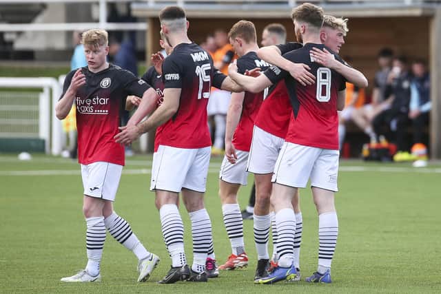 Gala Fairydean Rovers players congratulating Ciaren Chalmers on scoring against Gretna 2008 at Netherdale at the weekend (Pic: Craig McAllister)