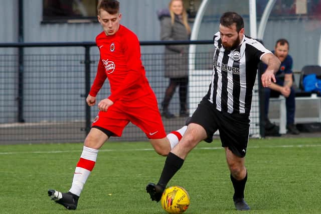 David Grant on the ball for Dunipace against Hawick Royal Albert United (Photo: Scott Louden)