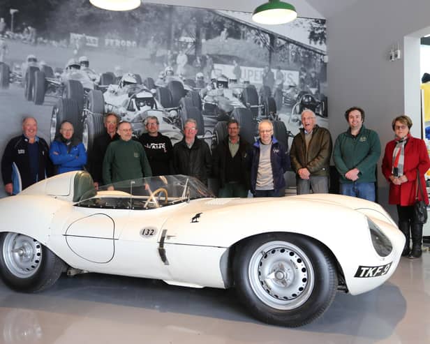 On hand to welcome the arrival of the Jaguar D-Type to the Jim Clark Motorsport Museum was from left: Jim Blackie, Steven Reed, Alastair Skinner, Andrew Tulloch, Simon Harper, David Phillip, Graham Fairley, Lawrence Johnston, Ian Deans, Kenneth McLean and Doreen Deans.