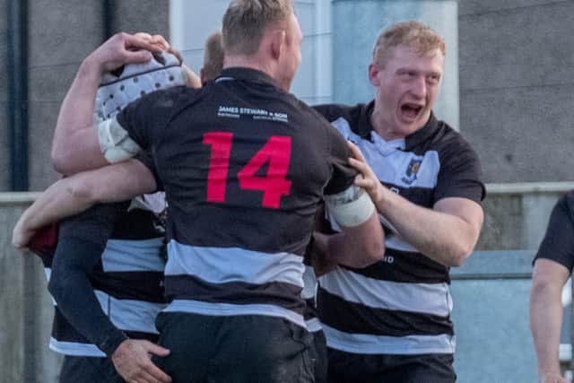 Kelso players celebrating one of their tries against Highland on Saturday (Pic: Charles Brooker)