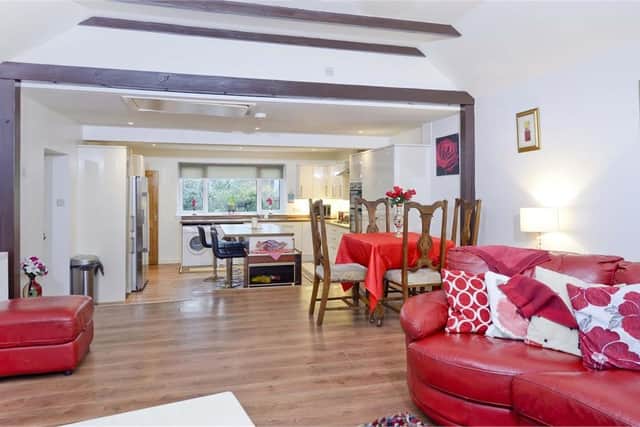 The comfortable snug opens to a fantastic open plan family kitchen and living area extension.