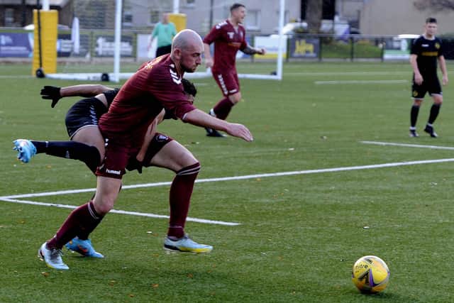 Joshua Loftus making a break for Langlee Amateurs at home to Tweedmouth Amateurs on Saturday (Pic: Alwyn Johnston)