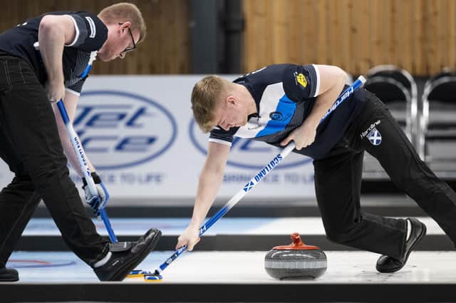 Angus Bryce, right, and Scott Hyslop in action for Scotland against Germany at 2022's World Junior Curling Championships in Jonkoping in Sweden (Photo: WCF/Cheyenne Boone)