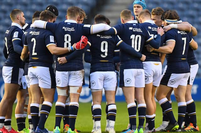 Scotland players huddling before kick-off during their Six Nations match against Wales at Murrayfield Stadium in Edinburgh on February 13, 2021. (Photo by Andy Buchanan/AFP via Getty Images)