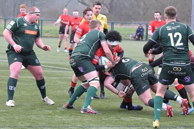 Hawick's Shaun Fairbairn and Ross Graham stopping a Glasgow Hawks attack in its tracks as captain Matt Carryer and Aaron Redpath look on (Photo: Malcolm Grant)