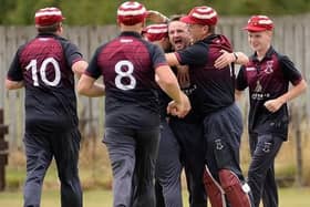 Rory Banks and teammates celebrating Selkirk’s six-run win at home to Westquarter and Redding on Saturday (Photo: John Smail)