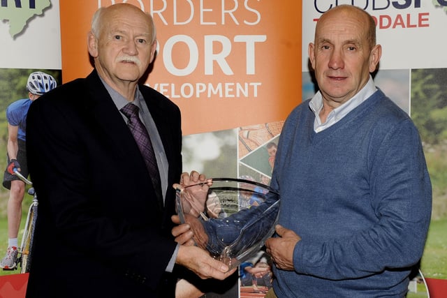 Tweeddale Rovers stalwart Jimmy Moffatt, right, being handed his award for services to sport by Rick Kenney