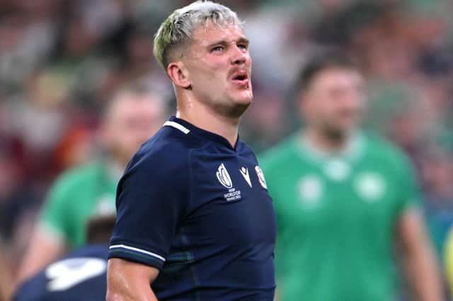 Darcy Graham going off injured during Scotland's Rugby World Cup knockout by Ireland on Saturday, October 7, in Paris (Photo by Stu Forster/Getty Images)