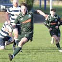 Centre Andrew Mitchell making a break during Hawick's 19-17 win away to Heriot's Blues on Saturday (Photo: Malcolm Grant)