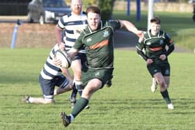 Centre Andrew Mitchell making a break during Hawick's 19-17 win away to Heriot's Blues on Saturday (Photo: Malcolm Grant)