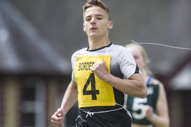 Hawick's Connor McLeod winning his heat in the 90m youth group races