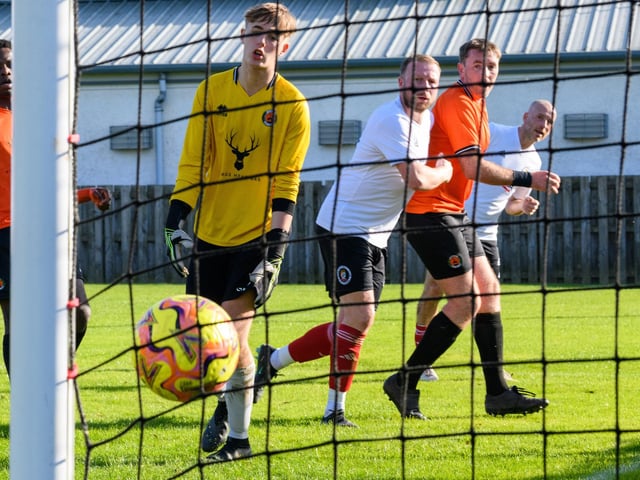 Kieran Cromarty in action for Duns Amateurs as they beat Hawick United 9-1 at home in round one of this football season’s Waddell Cup on Saturday (Photo: Alan Raeburn)