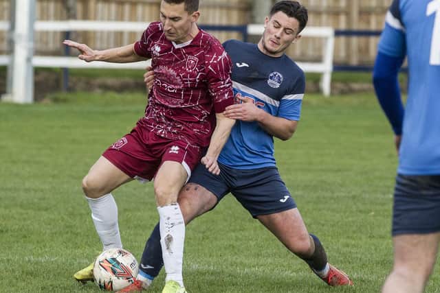 Gary Tickle putting a tackle in for Vale of Leithen versus Tynecastle (Pic: Bill McBurnie)