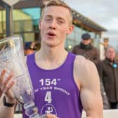 Scott Tindle with the Eric Liddell Trophy after winning the 2023 Edinburgh new year sprint at Musselburgh on Sunday (Photo: Alan Raeburn)