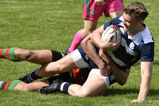 Callum Anderson scoring for Selkirk against Highland at Jed-Forest Sevens