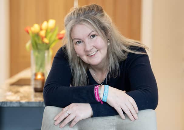 Ahead of World Cancer Day on February 4, cancer survivor Maureen Fox is calling on Scots to support Cancer Research UK’s life-saving work by donating monthly at cruk.org/donate or getting a Unity Band from one of the charity’s shops. Photo: Lesley Martin.